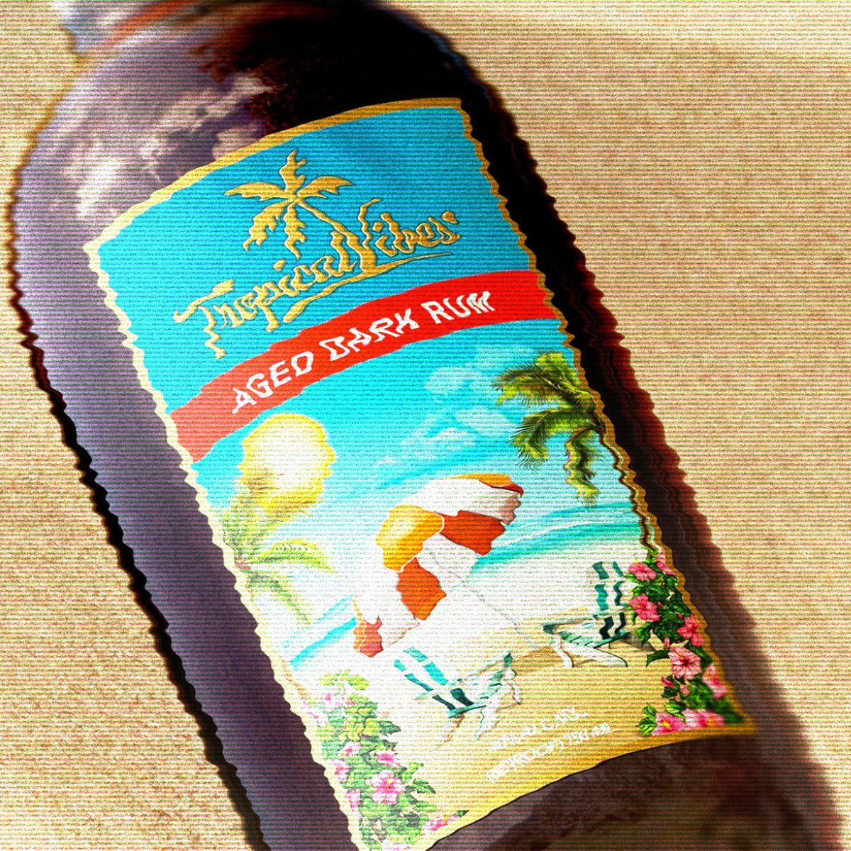 Original Tropical Vibes rum label shown at an angle on a neutral background, representing the brand’s evolution and redesign process.